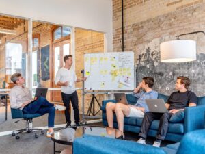 Austin web design team reviewing website wireframes, SEO performance, and mobile-first user experience strategy